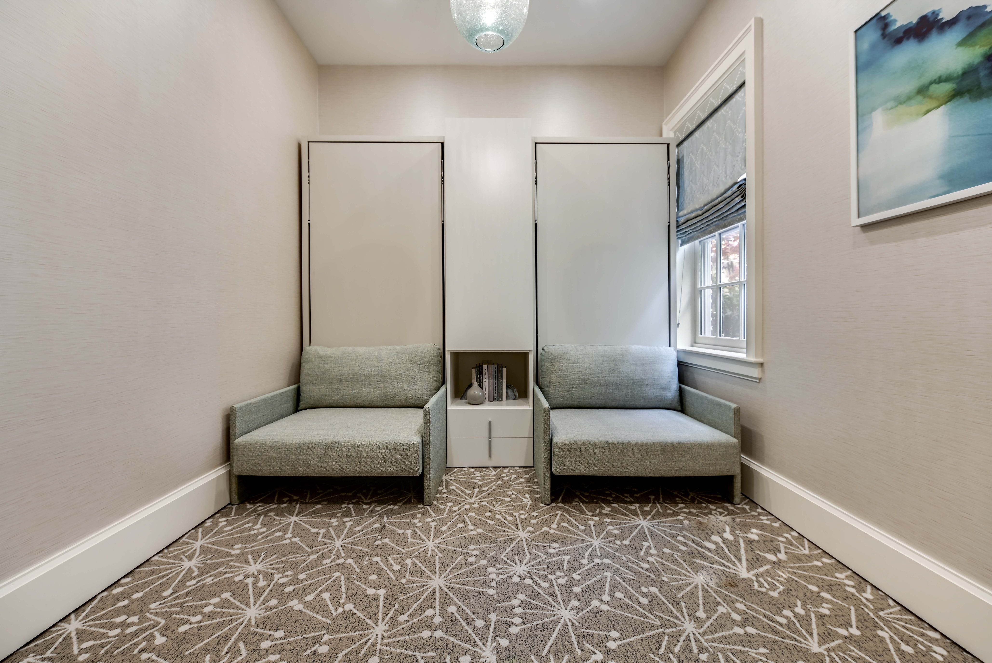 Altea Sofa Murphy bed with sofa in closed position, featuring two upholstered chairs in a compact, space saving furniture layout.