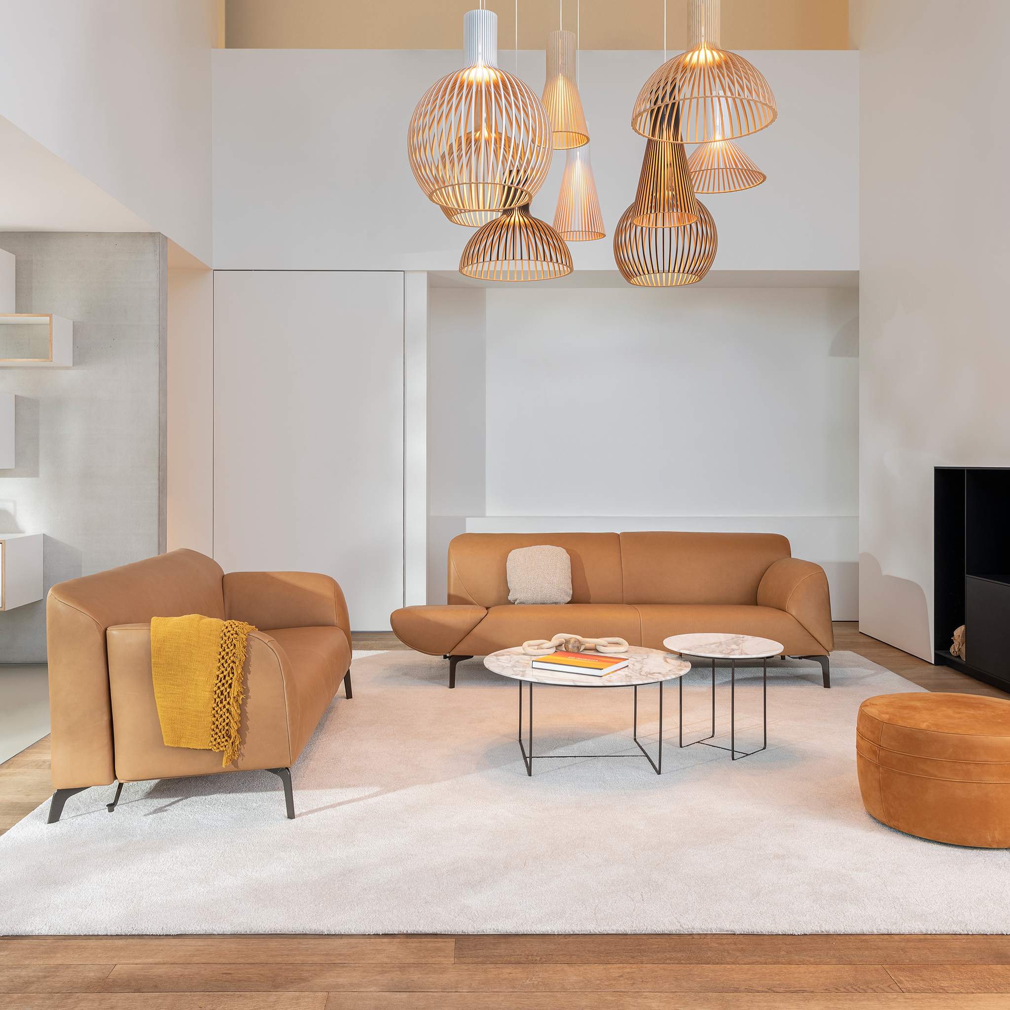 Como Sofa set with lounge chair, ottoman, and nesting tables in contemporary space