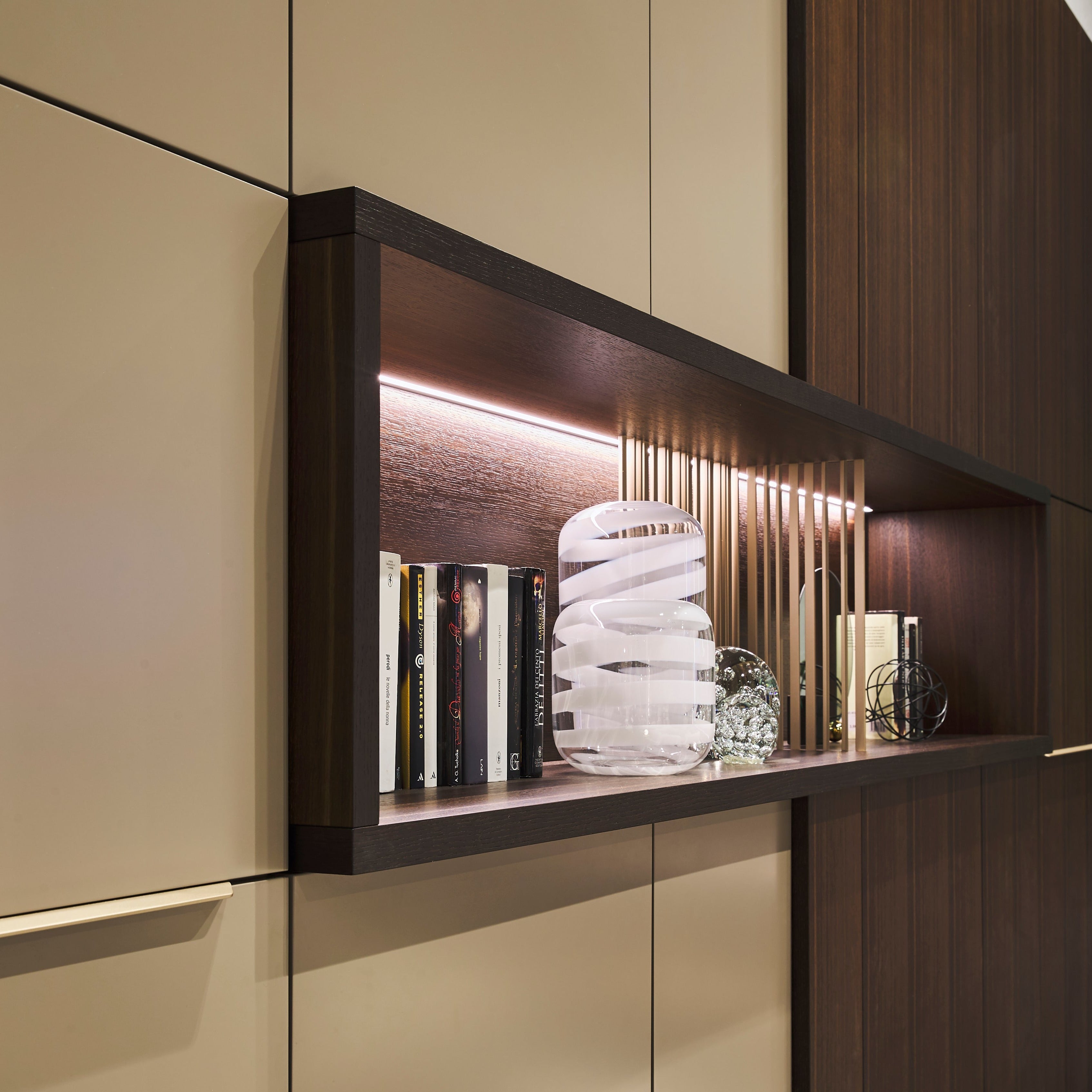 Detail view of custom entryway cabinet shelving with LED lighting and decorative accents – space saving furniture by Resource Furniture.
