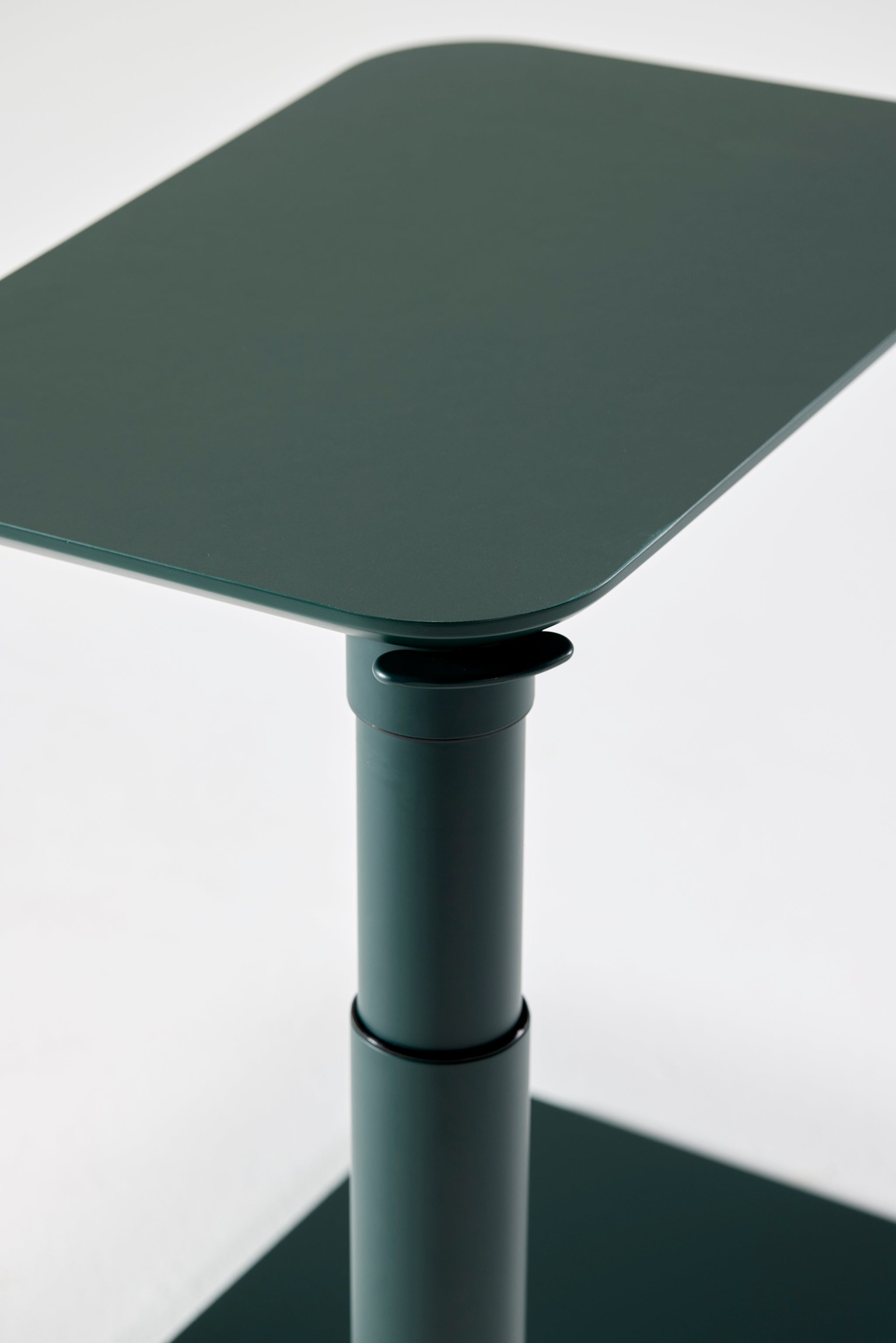 Precision-milled corner detail of the black Float Micro tabletop, emphasizing sleek craftsmanship.