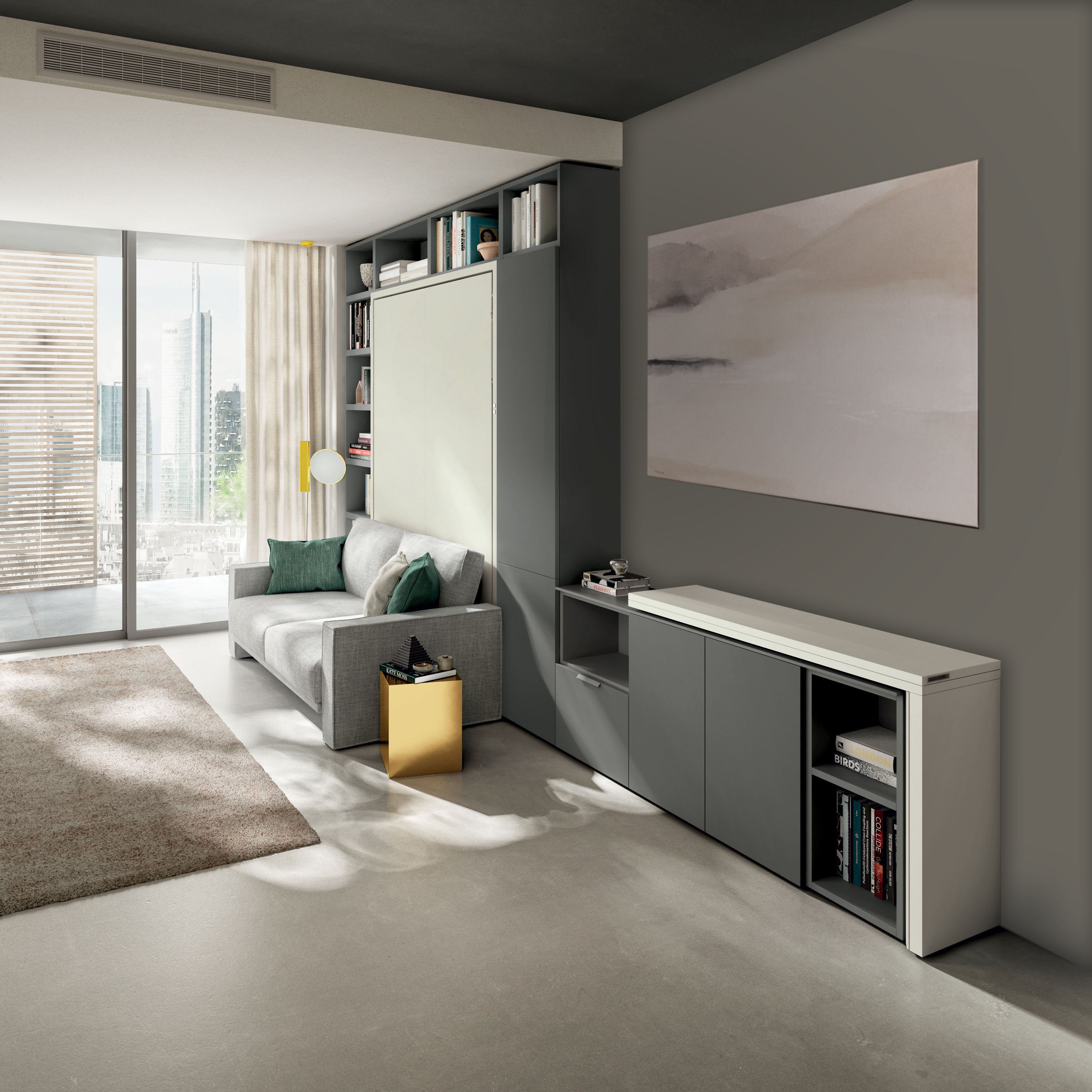 Giro transforming console table closed against the wall beside a modern sofa and modular wall bed in a compact living room by Resource Furniture