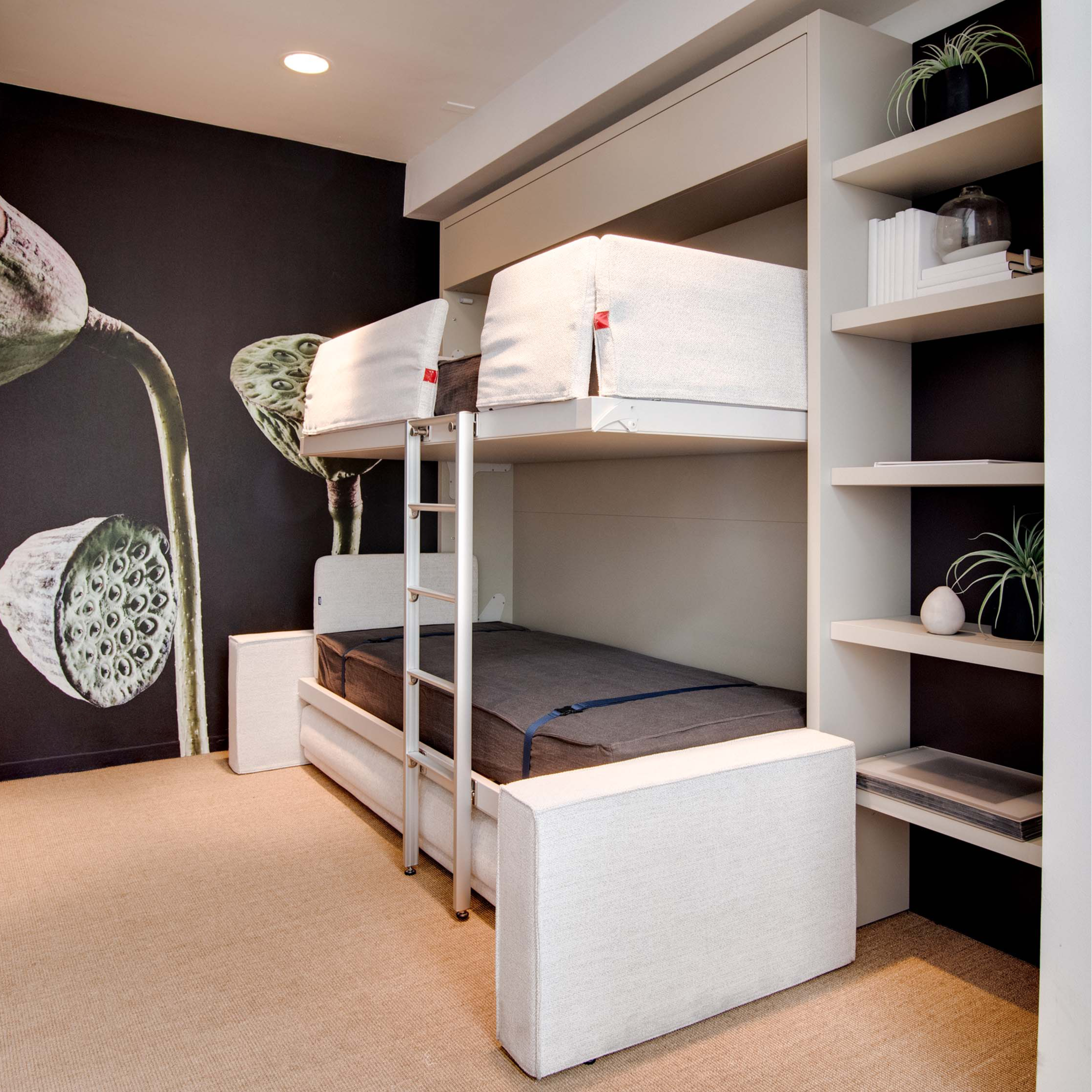 Transforming Kali Duo Murphy bunk beds with sofa fully extended, showcasing two twin XL beds in compact space saving design