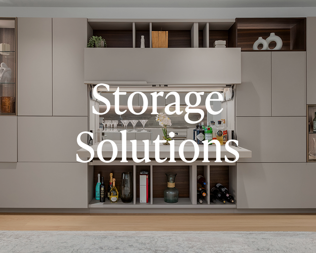 Modern hidden bar cabinetry with integrated lighting and multifunctional shelving by Resource Furniture, showcasing elegant storage design.
