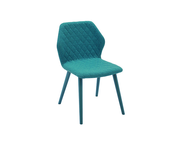 Three-quarter studio view of Ava dining chair with teal quilted seat and backrest, and matching blue-green legs.
