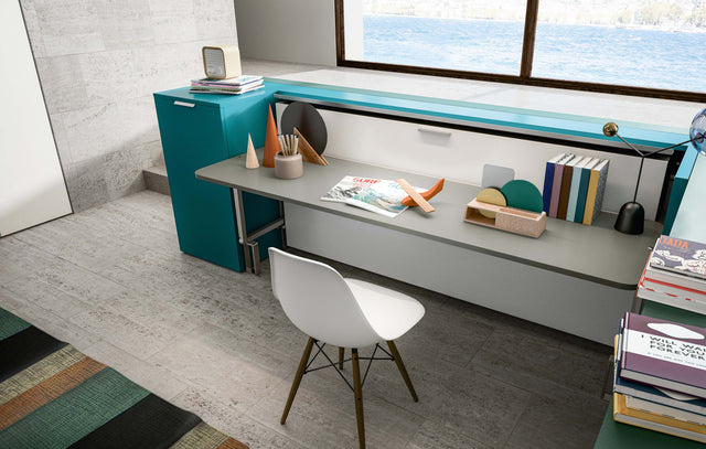 Cabrio Murphy Bed shown closed with the integrated desk in use, demonstrating a stylish space saving furniture solution for compact living or home offices.