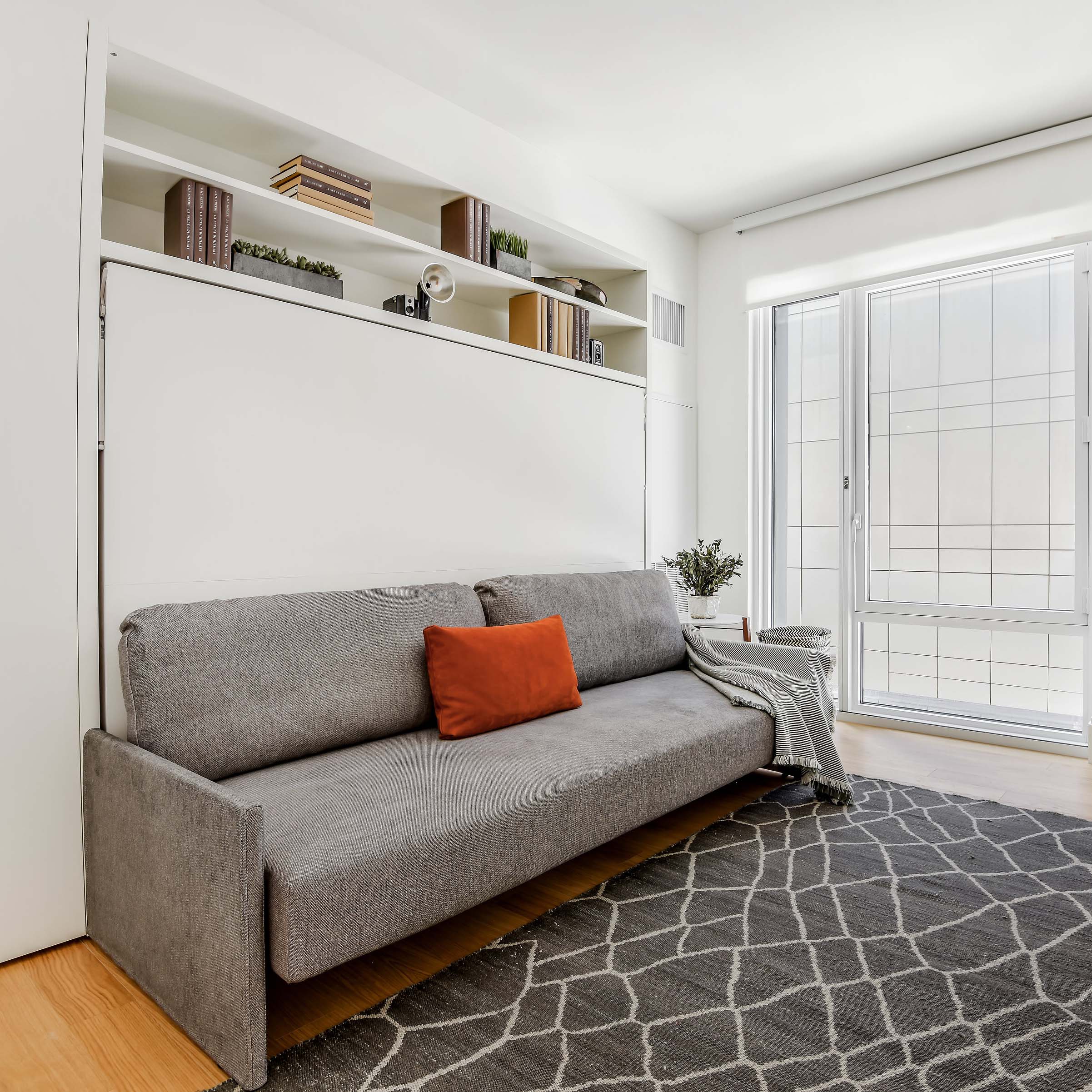 Circe Sofa closed in sofa position — a horizontal queen wall bed with integrated couch.