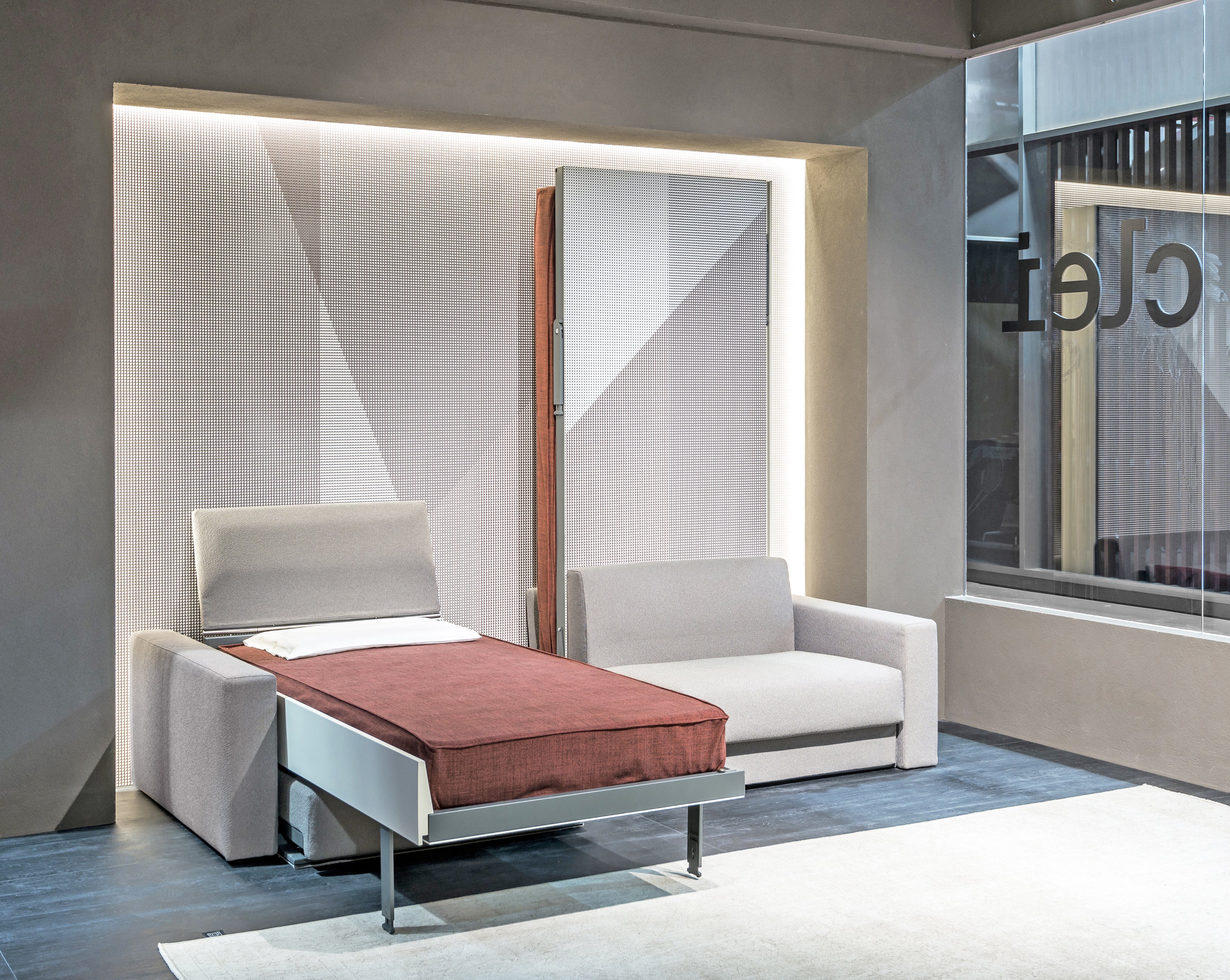 Ella & Louis Murphy bed system with one twin bed open and the second half in sofa position.