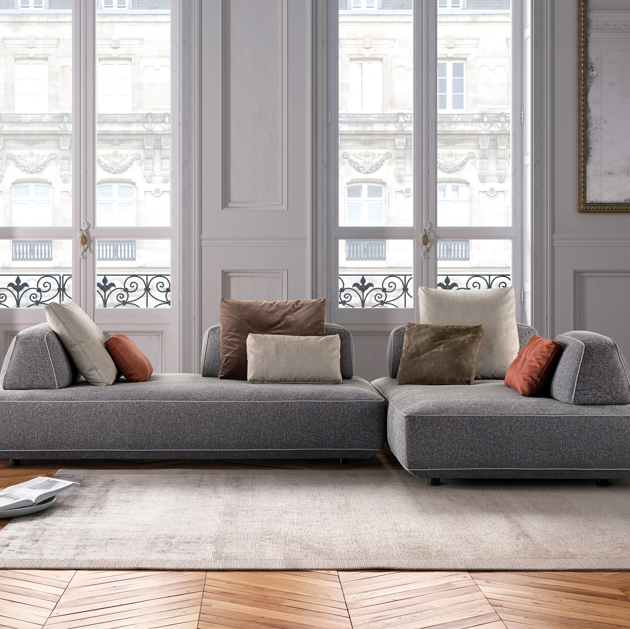 Art Nova Flex sectional sofa in a modern Parisian-style interior, featuring tailored upholstery, sculptural cushions, and modular lounge configuration.