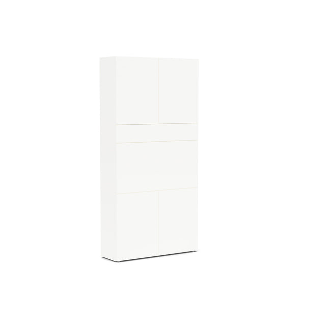 Home Office compact desk closed into a sleek white cabinet with hidden work surface and integrated storage; ideal for small space furniture or multifunctional office setups.