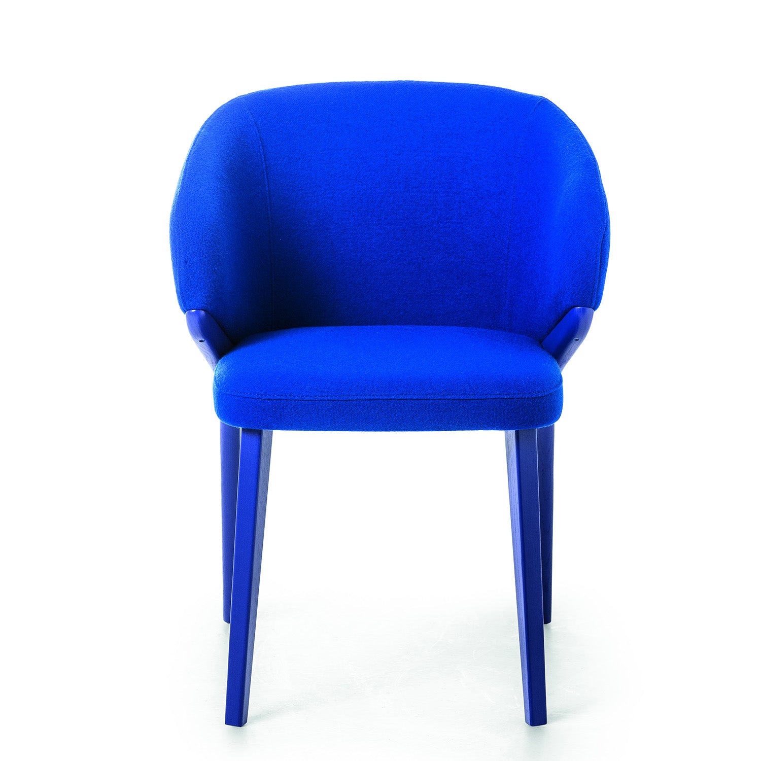 Front view of Nora dining chair in royal blue fabric with wraparound backrest and color-matched legs.