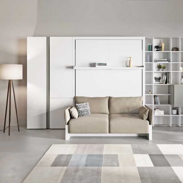Nuovoliola queen wall bed with integrated beige sofa and modern built-in shelving.