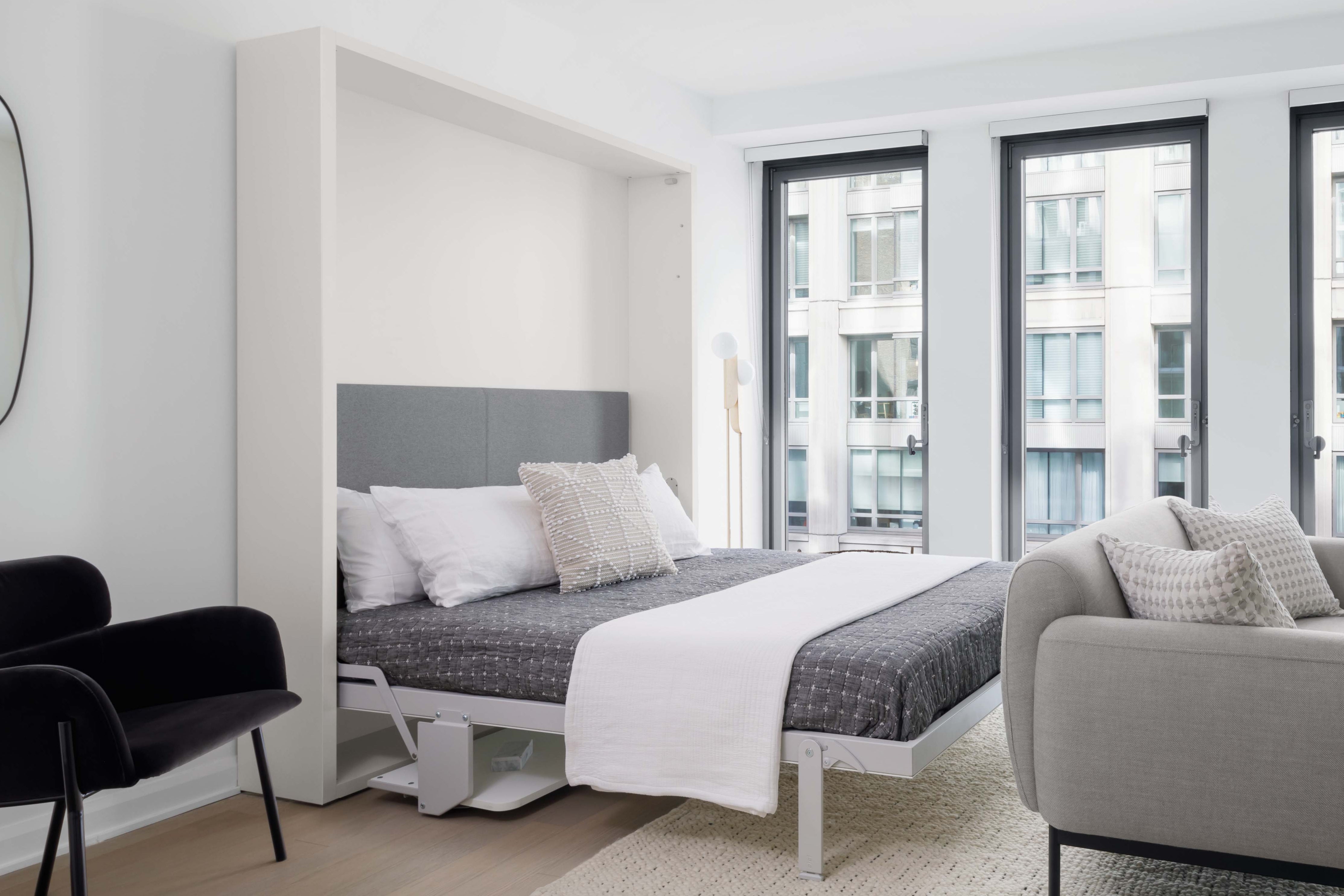 Penelope Desk Queen Murphy bed open with built-in shelving – multifunctional furniture for small spaces