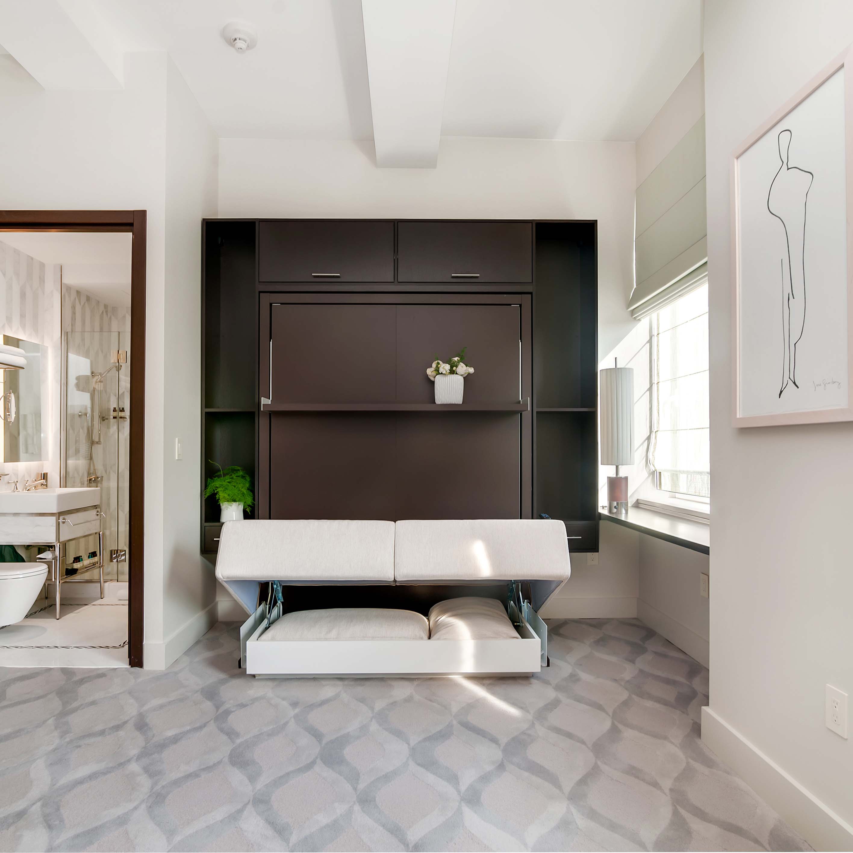 Swing 0 Murphy bed in transition, with sofa seat lifted to reveal folding bed mechanism in dark wood wall unit.