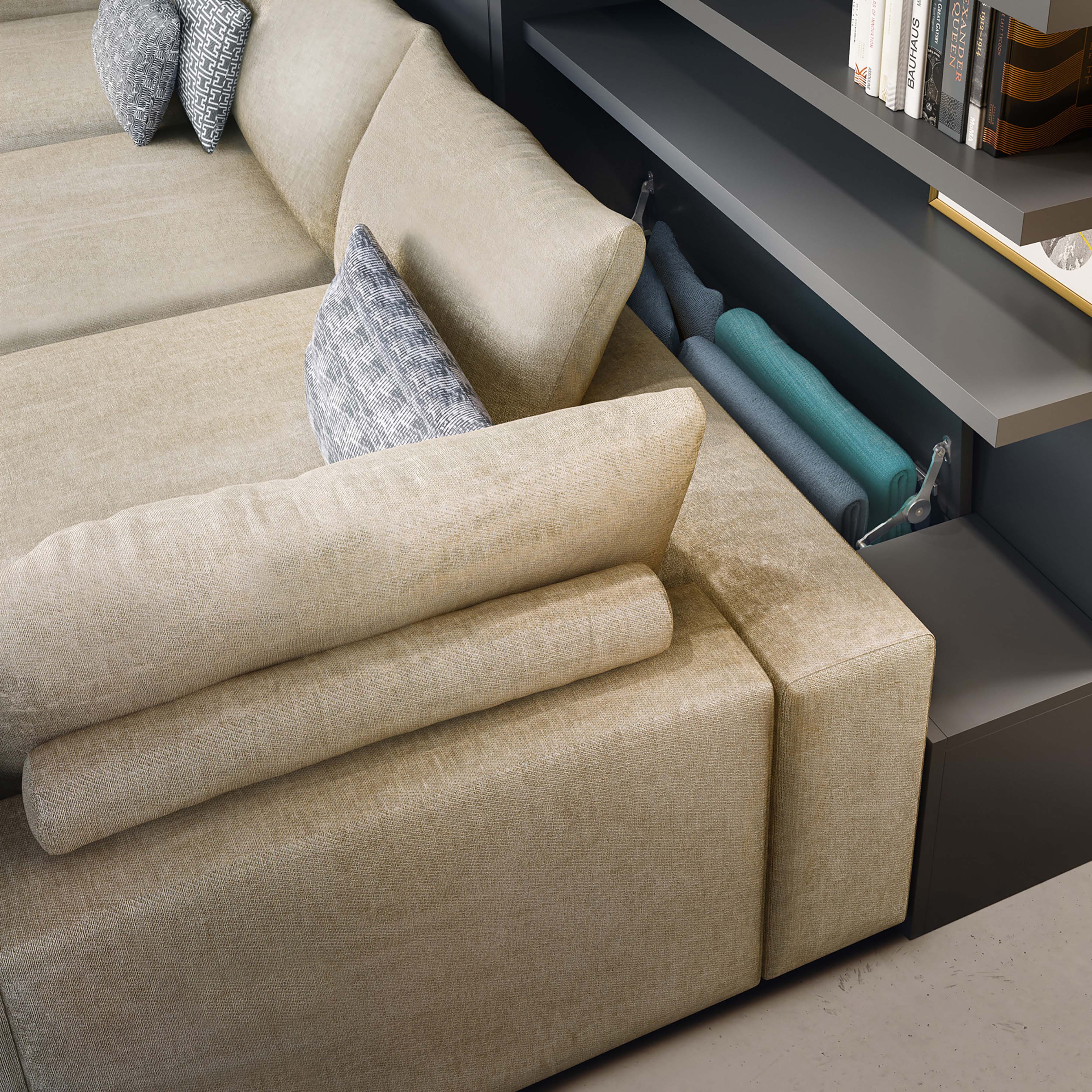 Close-up of Tango Sectional armrest with hidden storage compartment for bedding or accessories.