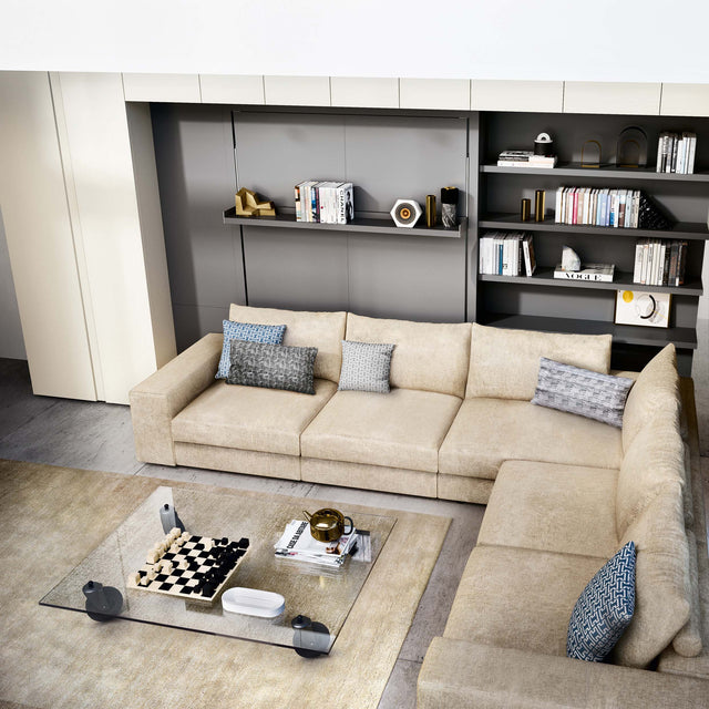 Tango Sectional Murphy bed in closed position, beige modular sofa with built-in shelving and modern coffee table.