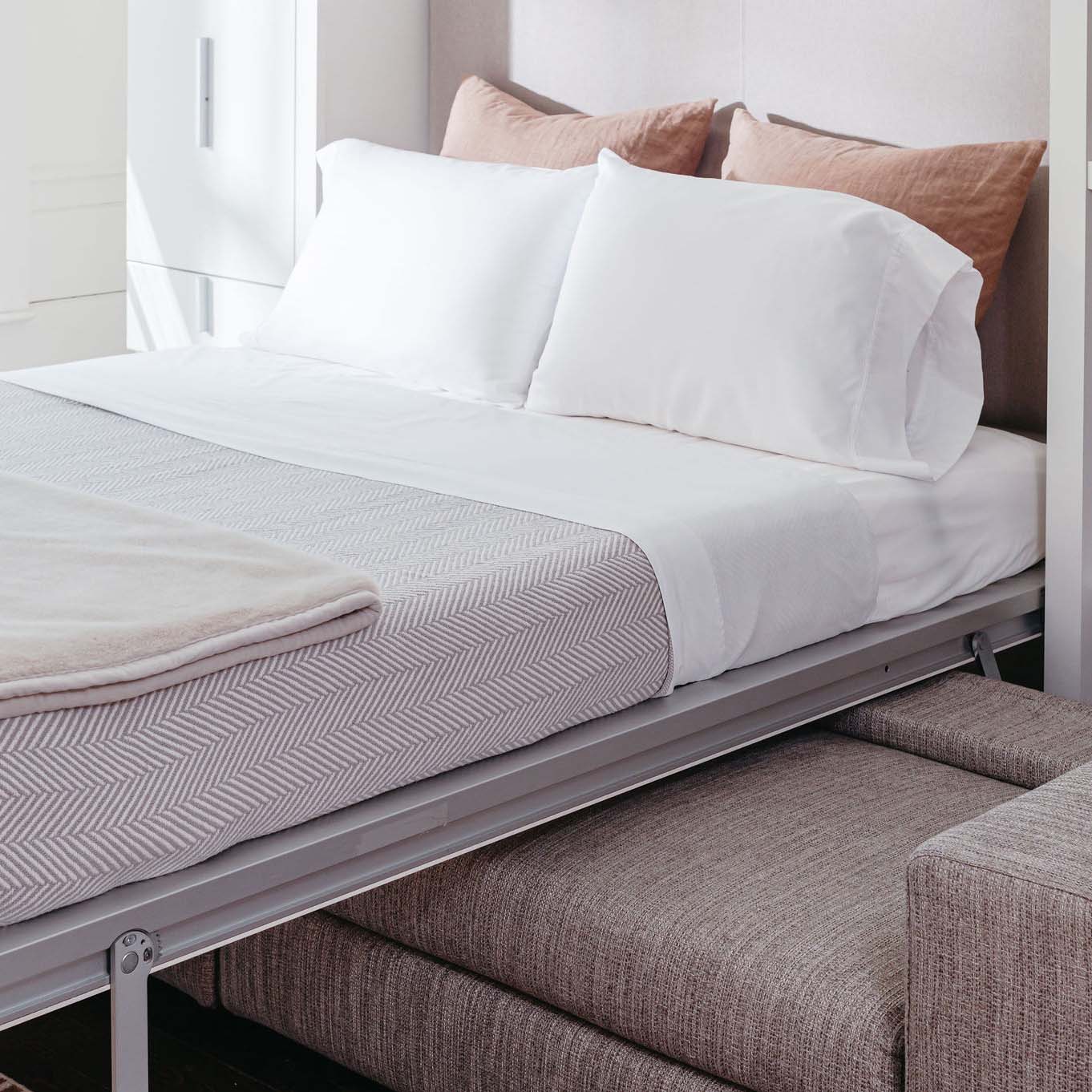 Close-up of the queen wall bed from the Tango Sofa system, featuring premium upholstery and integrated support—ideal for luxury multifunctional living spaces.