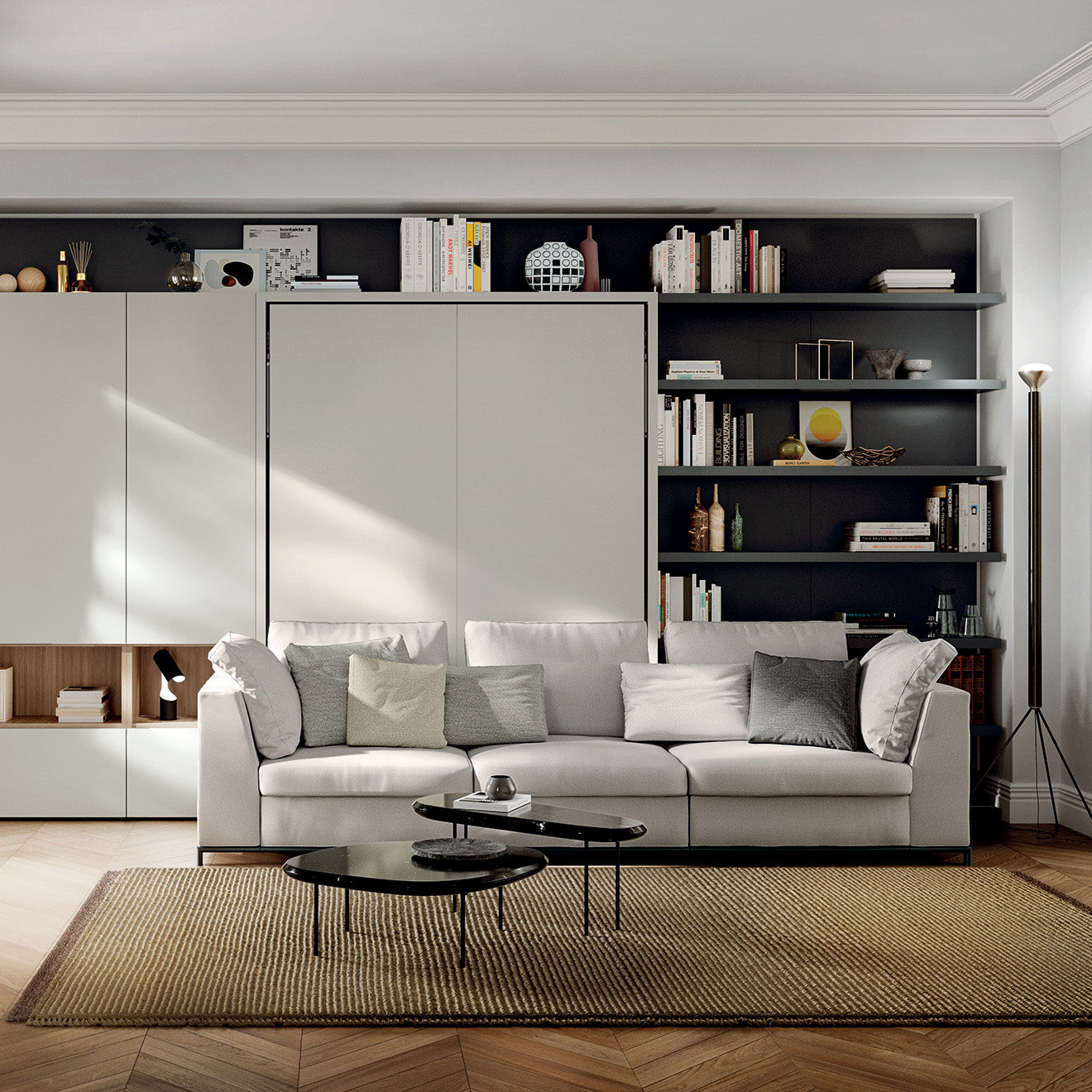 Tonale Sectional sofa in front of a closed wall bed system with integrated shelving—ideal for elegant multifunctional living spaces and modern interior design.