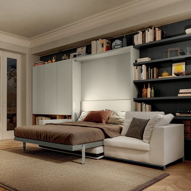 Angled view of the Tonale Sectional wall bed in the extended position, combining a plush modular sofa and integrated headboard—ideal for luxury multifunctional interiors.