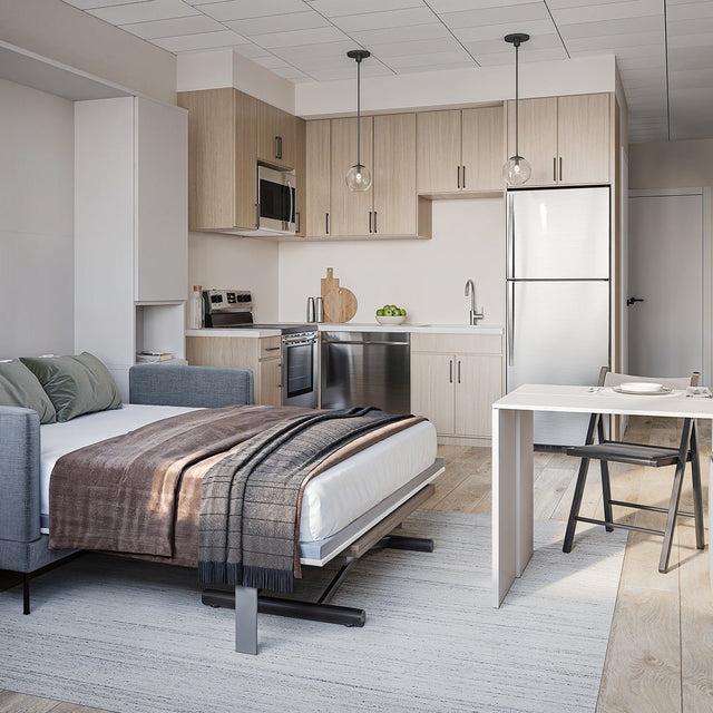 Park75 studio rendering featuring a Penelope wall bed in lowered position with integrated sofa, white cabinetry, kitchen, and dining area.