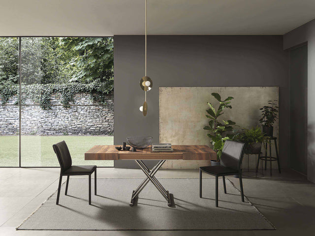 Cristallo Mini table extended into a functional dining table, seamlessly blending into a stylish dining area.