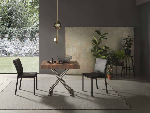 Cristallo Mini table elevated into a small dining table setup, paired with contemporary dining chairs in a cozy living space.