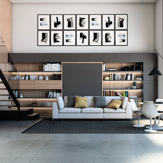 Spacious modular shelving unit with open and closed compartments, styled with books and decor.