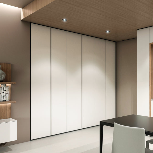 Minimalist single and double-door wardrobes in a neutral finish, showcasing a sleek, flush design and customizable handles.