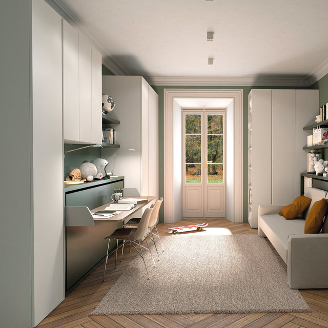 Home office setup with single and double-door wardrobes, a twin wall bed with integrated desk, a twin sofa wall bed, and a large window allowing natural light.