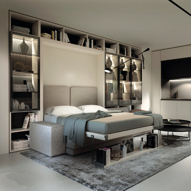 Upper Cabinets in a contemporary bedroom, paired with a wall bed and illuminated modular shelving for storage and display.