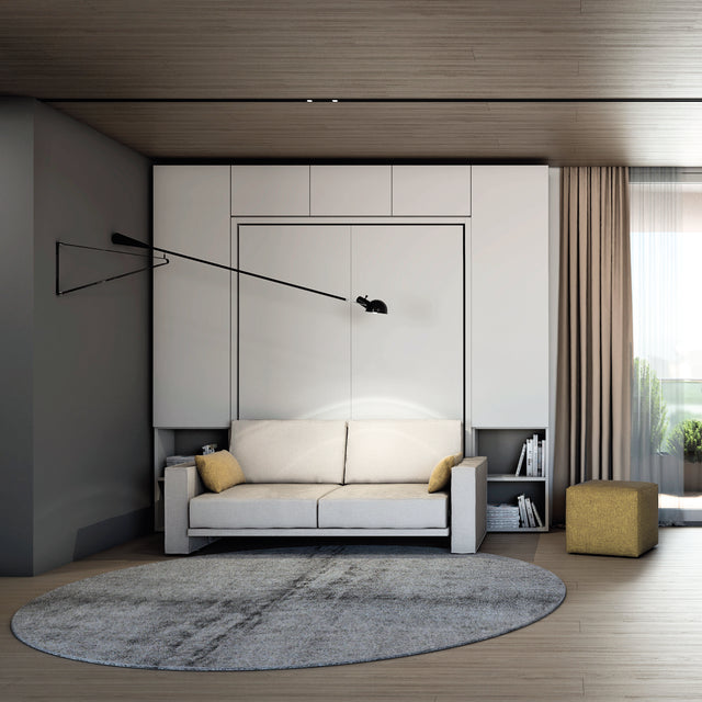 Penelope Sofa wall bed in its closed position, featuring a sleek sofa design with integrated side shelving and a contemporary interior.