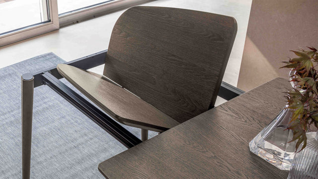 Detail of the Surf table extension mechanism, showcasing its integrated self-storing leaf for effortless transformation.