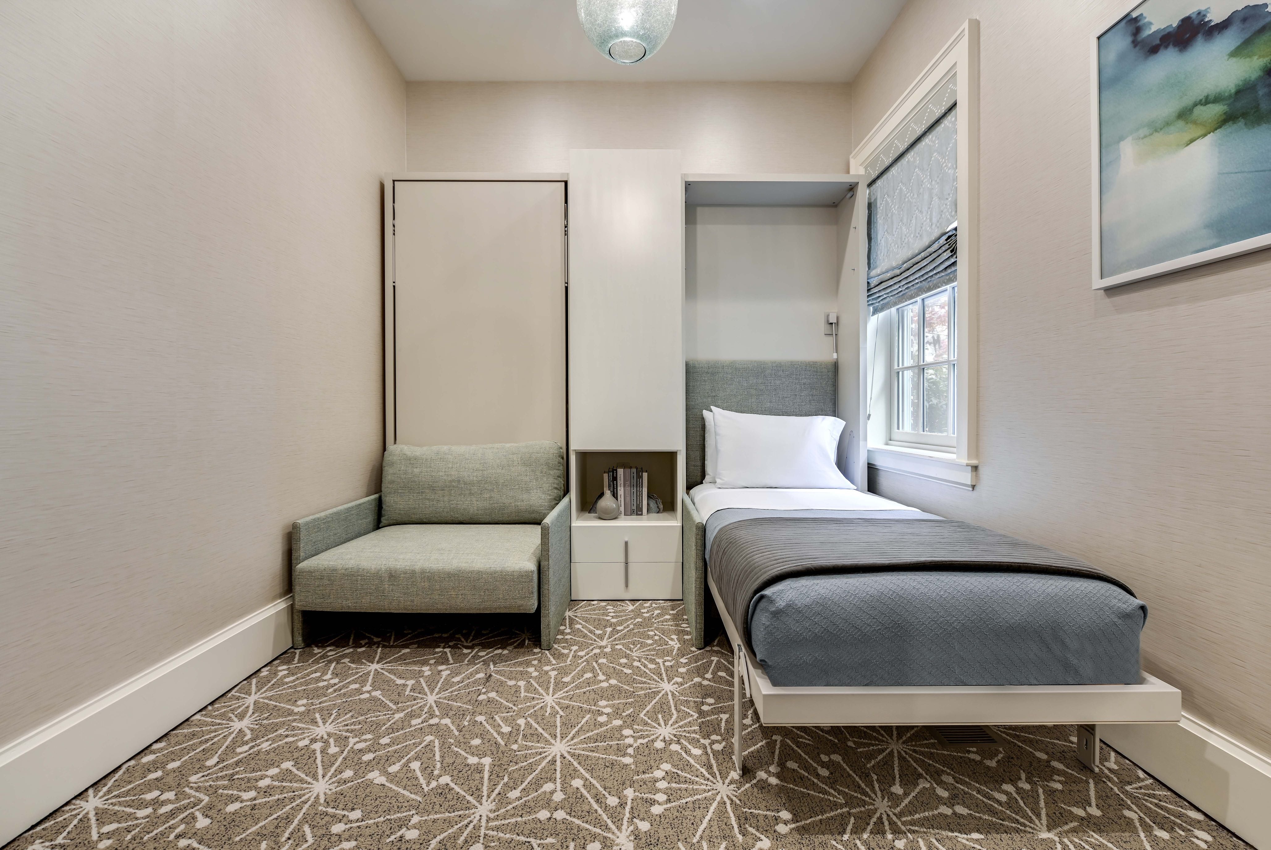 Altea Sofa Murphy bed with sofa shown open on one side, transforming from lounge seating to a twin bed for space saving living.