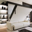 Atena Vertical wall bed with sofa opening from sofa to bed in a multifunctional living space.