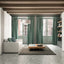 Side view of the Ella & Louis space-saving Murphy bed with sofa in closed position in a modern apartment living room.