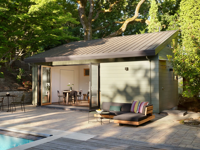 Project Hermosa poolside guesthouse with the Penelope wall bed, designed by Type Five, Nanawall open to the pool.