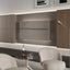 Maxi Bar closed as a sleek wall-mounted cabinet within a custom storage wall system in a modern living room.
