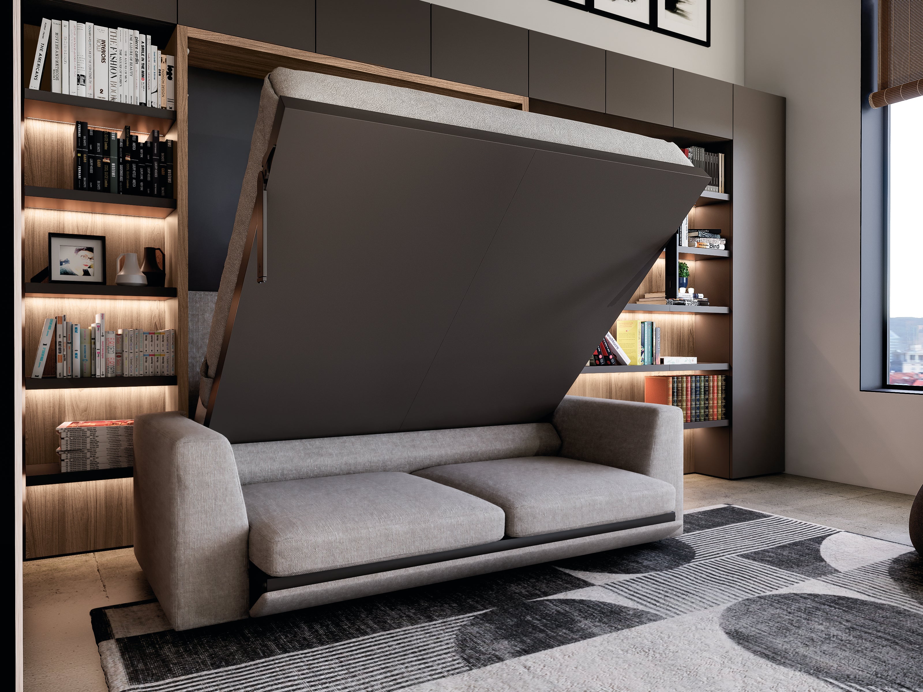 Tonale Sofa by Resource Furniture — light gray sofa with an integrated Murphy wall bed partially open above it in a compact living room with built-in illuminated bookshelves; space-saving furniture and modern seating for small spaces.
