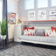 Cabrio Murphy Bed shown in sofa configuration with decorative pillows, highlighting multifunctional space saving furniture for small home offices or guest rooms.