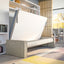 Circe Sofa horizontal queen wall bed lowering into bed position over built-in couch – Murphy bed with couch for small space furniture solutions from Resource Furniture