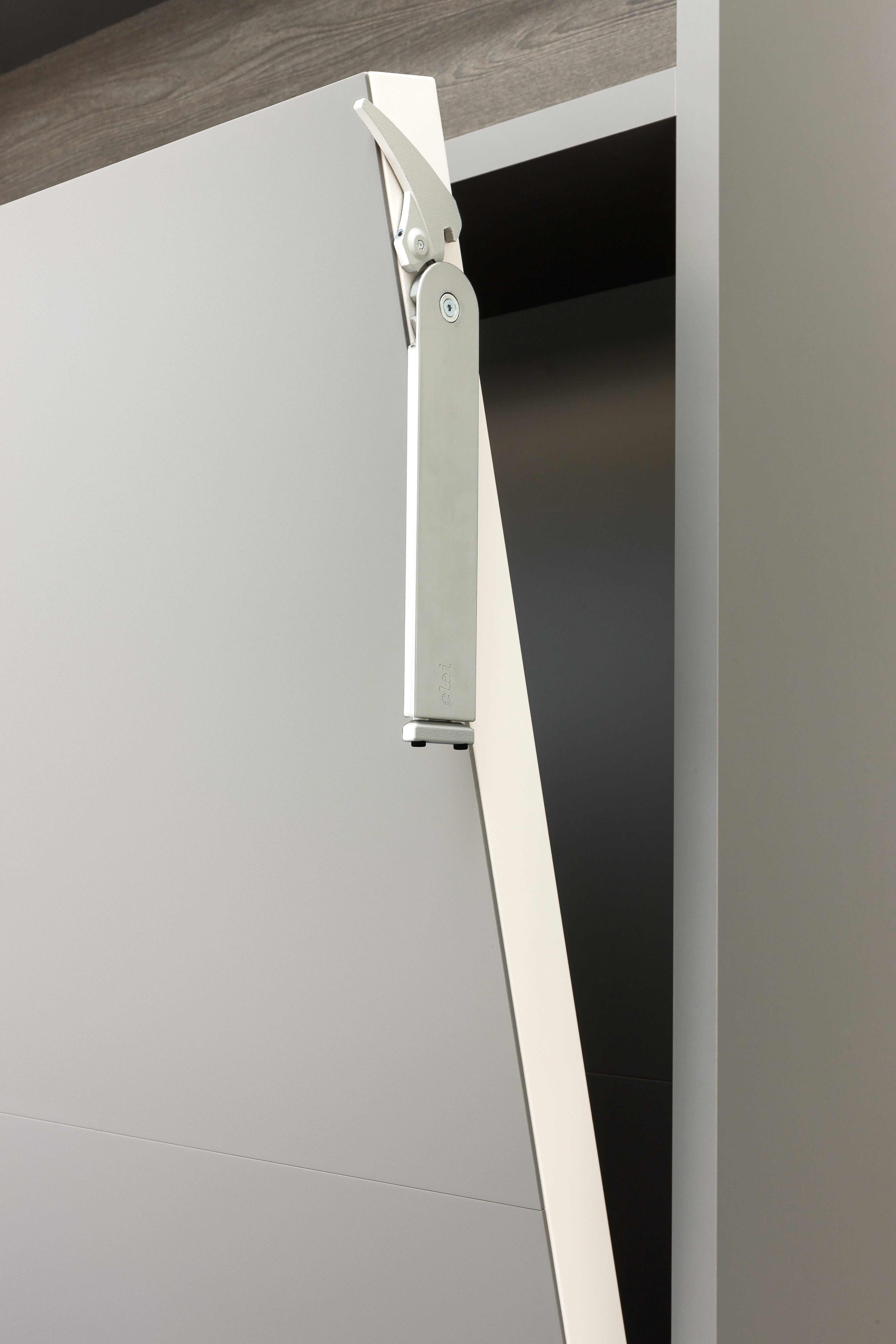 Close-up of the foot hardware on the Penelope queen Murphy bed, showing the durable metal leg mechanism for space saving furniture solutions.