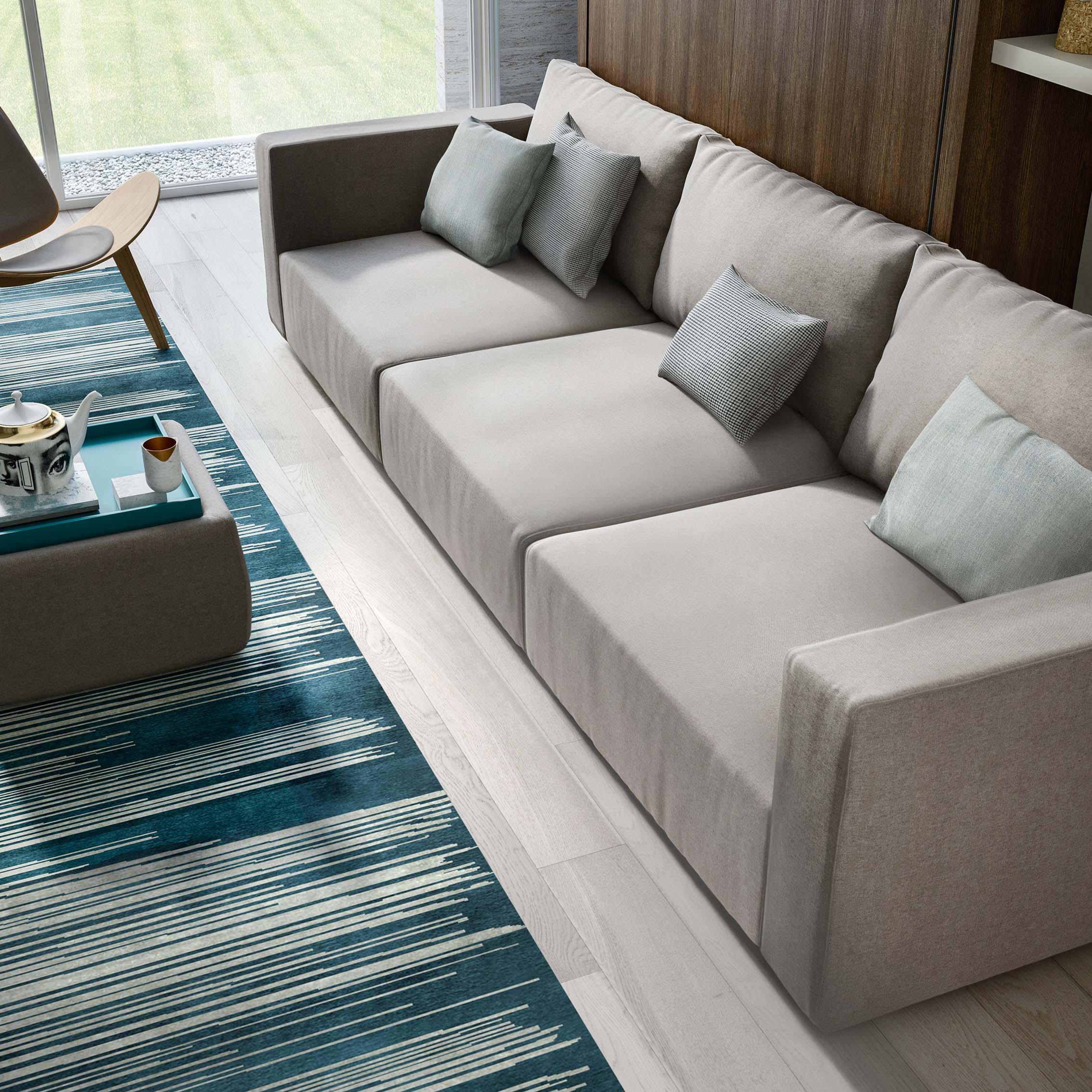 Modern wall bed with chaise lounge and bookshelf in a compact living room setup.